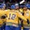 MINSK, BELARUS - MAY 11: Sweden's Joakim Lindstrom #12 celebrates with teammates after Team Sweden's second goal of the game during preliminary round action at the 2014 IIHF Ice Hockey World Championship. (Photo by Richard Wolowicz/HHOF-IIHF Images)

